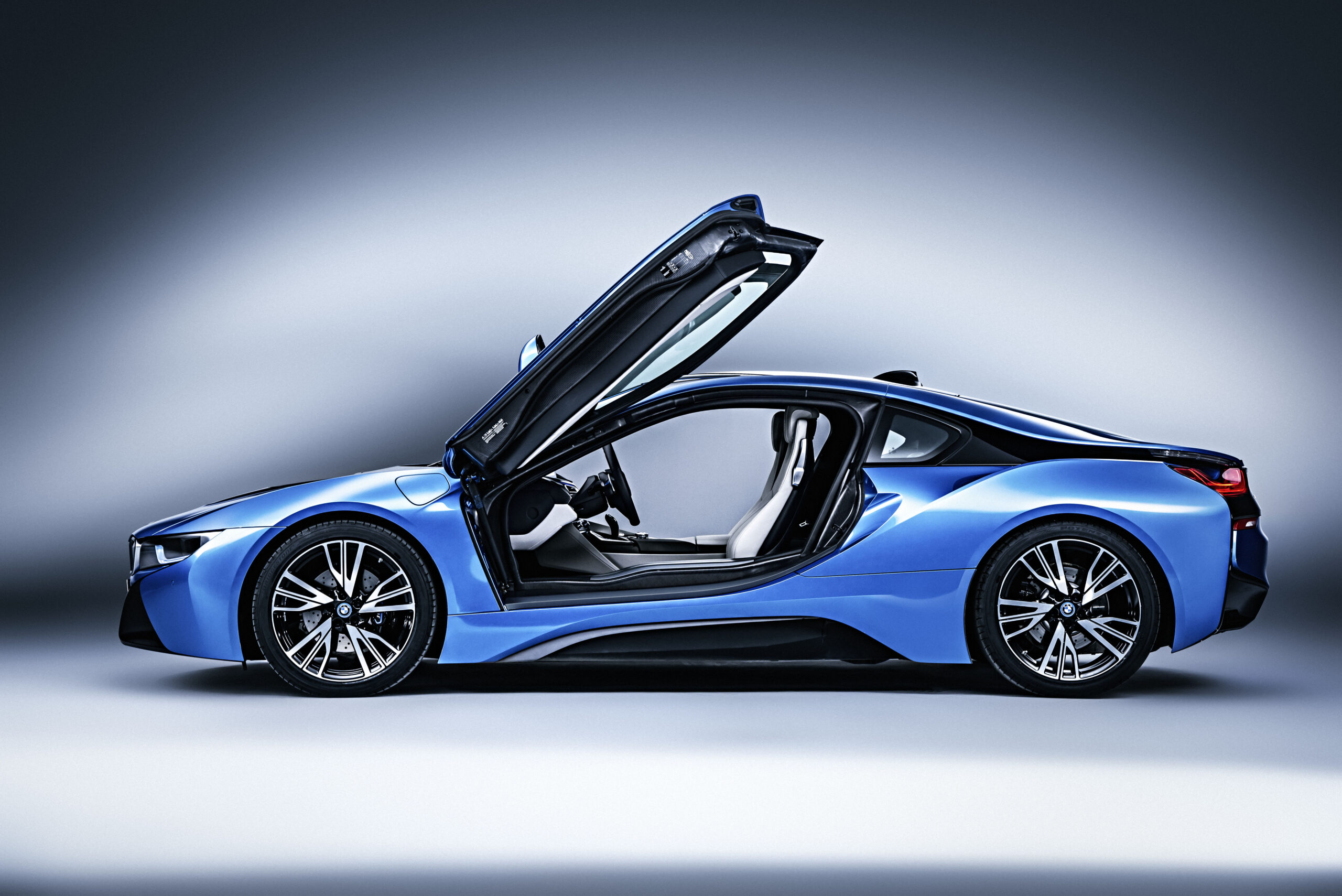 blue bmw i8 with doors raised