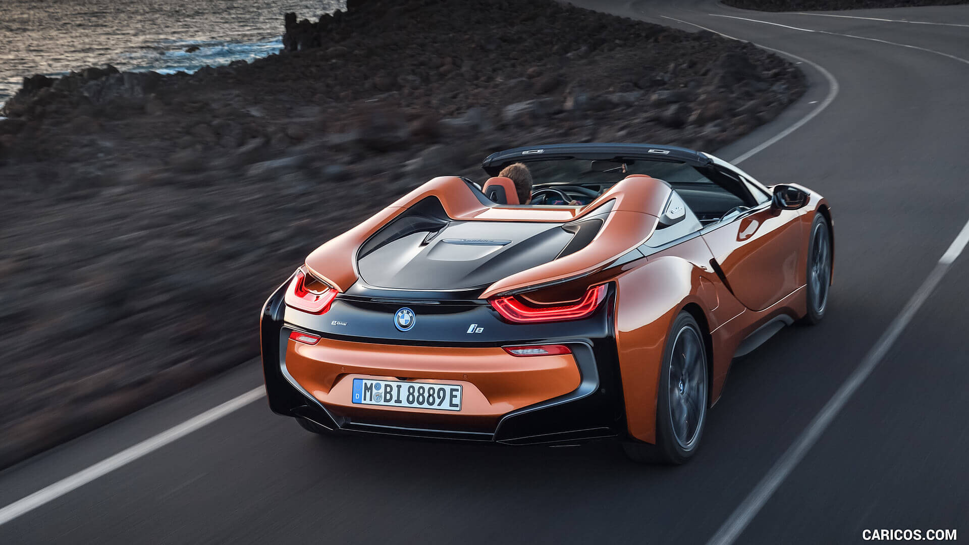 roadster oragne convertible version of bmw i8