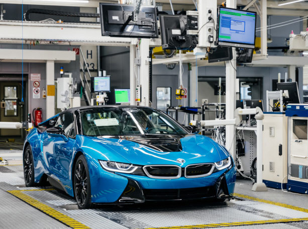 blue bmw i8 in production factory being manufactured